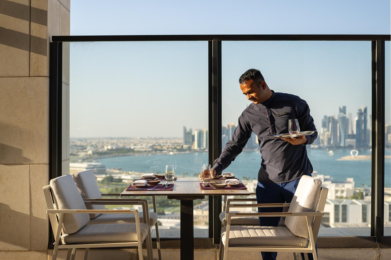 Park Hyatt Doha Hotell Exteriör bild A butler at the Jumeirah Atlantis Hotel in Dubai